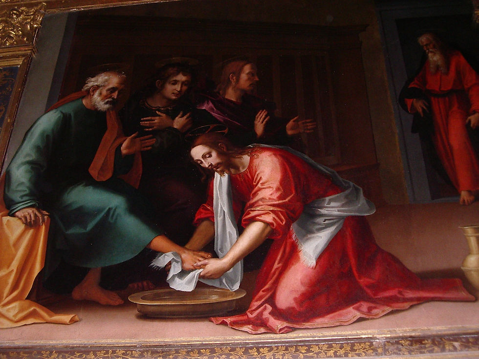 Jesus lavant les pieds à un apôtre