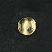 Gold thread neatly stitched into black leather.