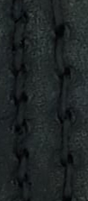 Black stitching seamlessly blending with black leather.