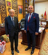 MHP Diyarbakır İl Başkanı ve ziyaretçisi ile resmi fotoğraf