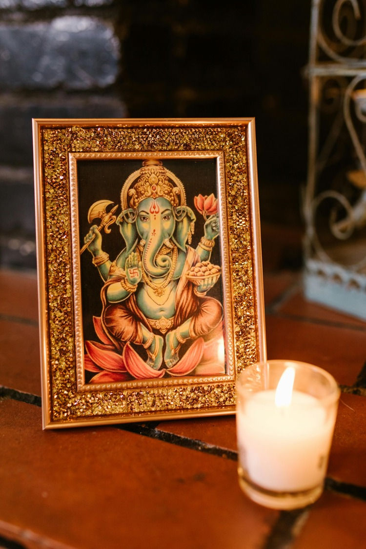An indian god next to light
