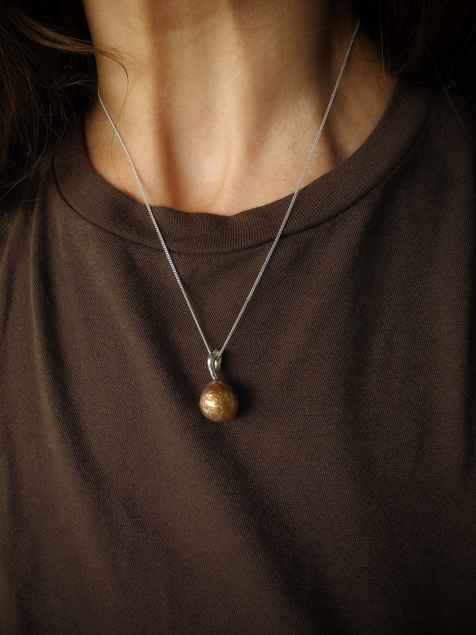 Thumbnail: Pearl tailsman pendant