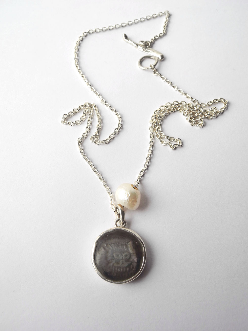 Thumbnail: cat consciousness necklace