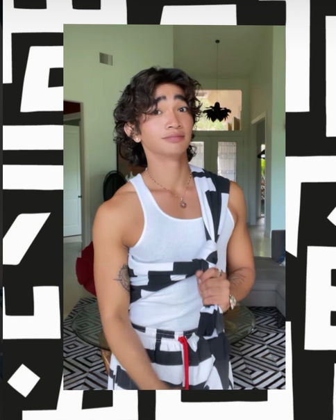 Bretman Rock wearing black and white jogger with maze pattern by EL BOUM