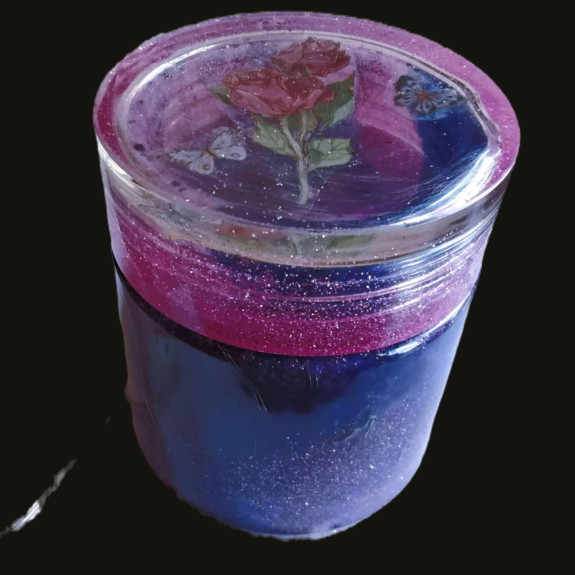 Purple and Pink Glitter Large Jar With a Rose and Butterflies On Top.