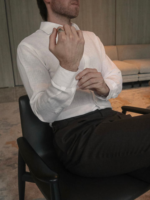 white linen shirt adjusting cuff