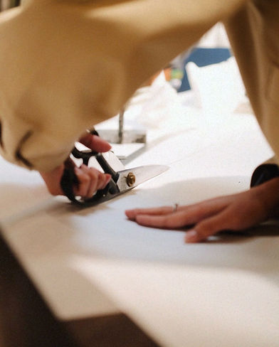 tailor cutting pattern piece