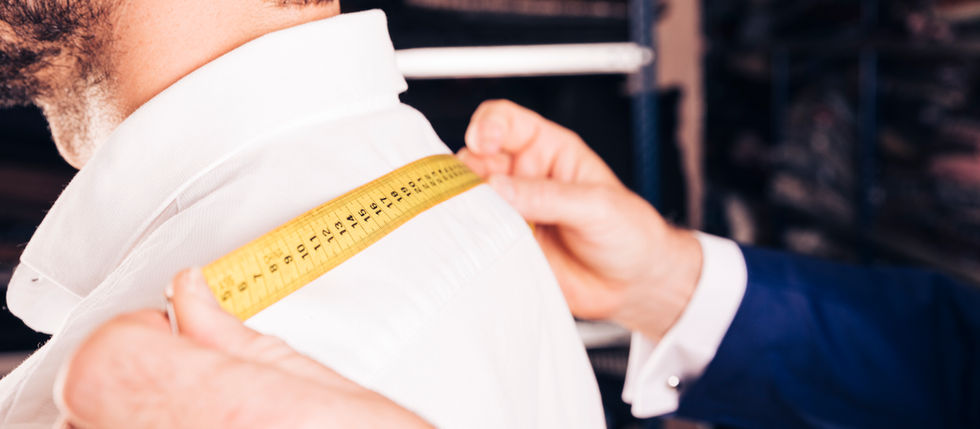 tailor measuring a client