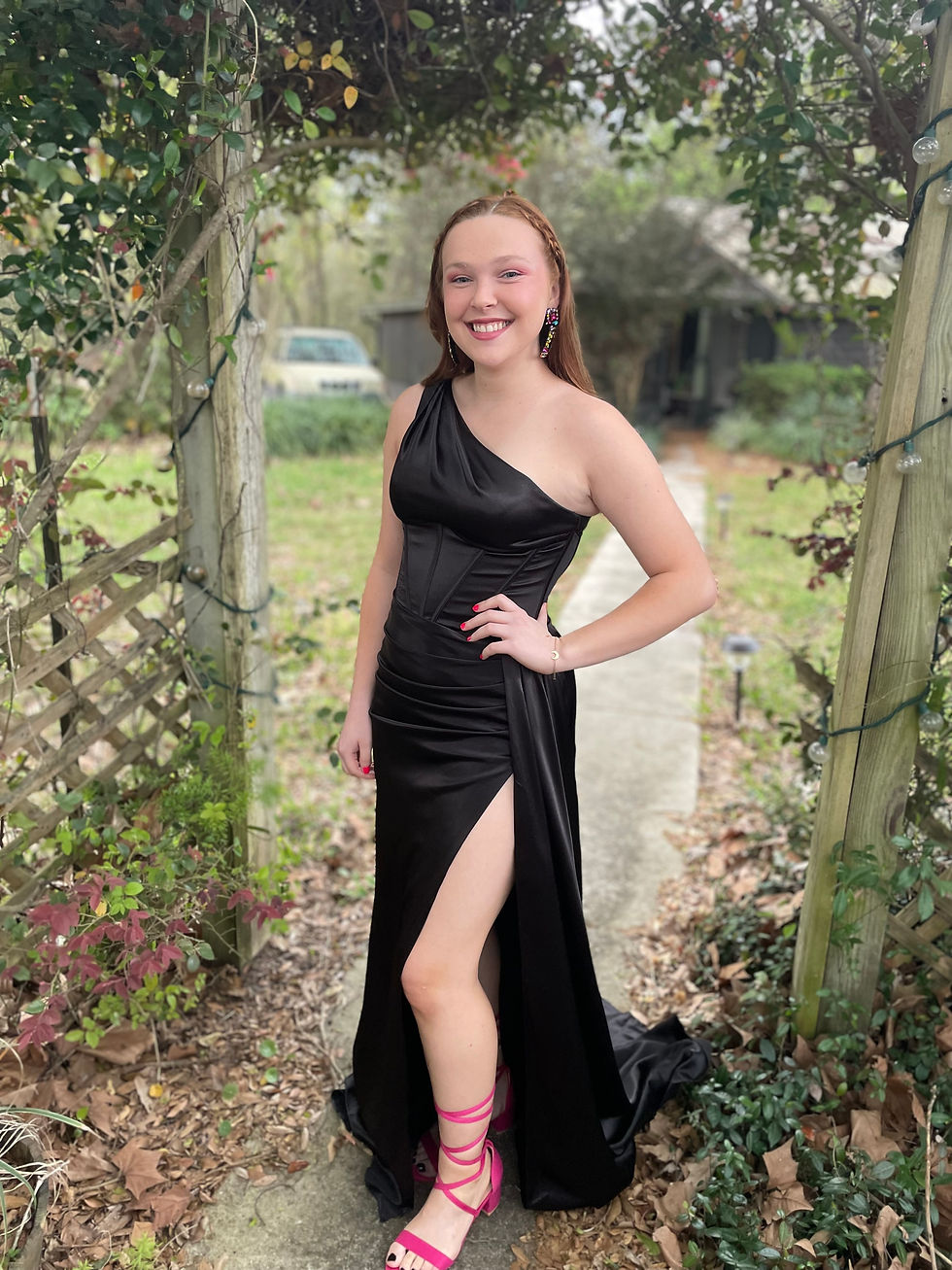 Jenna posing in black dress