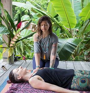 Dr. Sarah giving a Reiki session