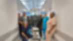 Surgical team at Crestcare Zoutpansberg Hospital standing around the Smith+Nephew Cori robotics-assisted knee surgery system in a modern operating theatre.