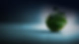 globe with green buildings and plants