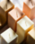 Orange and beige handmade candles by Iconic Candles. Product Photography Sydney by Noisy Photos