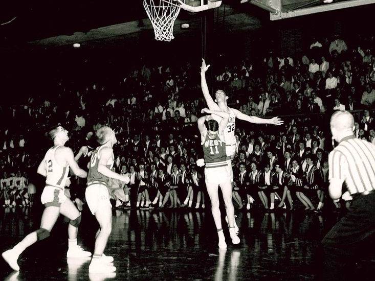 #12 Bill Wendel, #32 Tom Jones (shooting) vs. Topeka West Chargers, c. 1962.