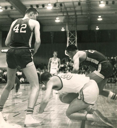 #42 Royce Adkisson & Tom Lewis (in dark jersey at right), Wyandotte High School Basketball, Kansas City, Kansas, c. 1956.