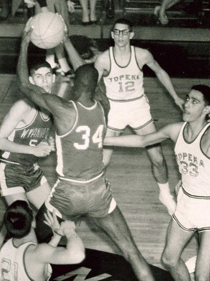 George Yarnevich, #34 Lucius Allen (rebounding) in dark jerseys. In white jersey for Topeka Trojans, #33 Mike Torrez, c. 1964.