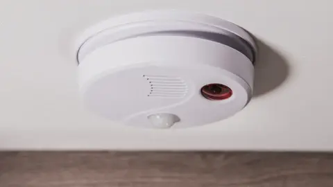 Carbon dioxide/monoxide alarm affixed to the ceiling