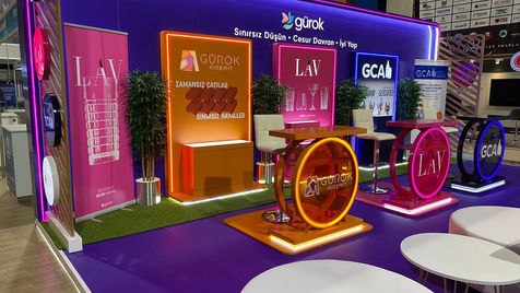 A massive holding company stand, designed by BayZ Design Architecture for Gürok Group, showcasing their glass packaging and tableware collections at the international glassware and industrial fair.