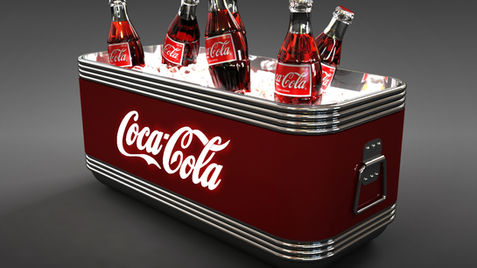 Coca-Cola bottles in a red cooler filled with ice, with the Coca-Cola logo. Display stand.