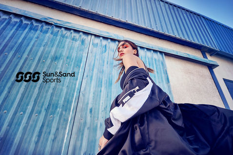 photo from a fashion session, a woman wearing sports clothes against the background of a blue building, street photography, lifestyle photography, sports photography, dubai photography, industrial locations, industrial photo shoot, swag, dope, sport clothes, Nike, Adidas, Vans, gangsta, girl, street style, streetwear, urban style