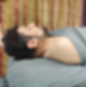 Mobile Bodywork by Aaron- massaging a man's neck on a table