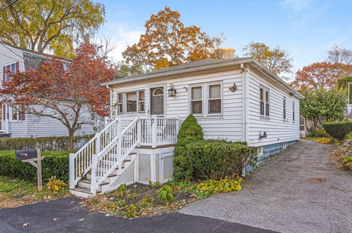 exterior photo of small white house