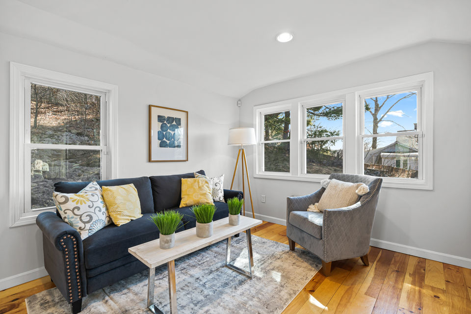 living room with yellow accent pillows