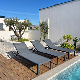 Relax in the sun by the pool