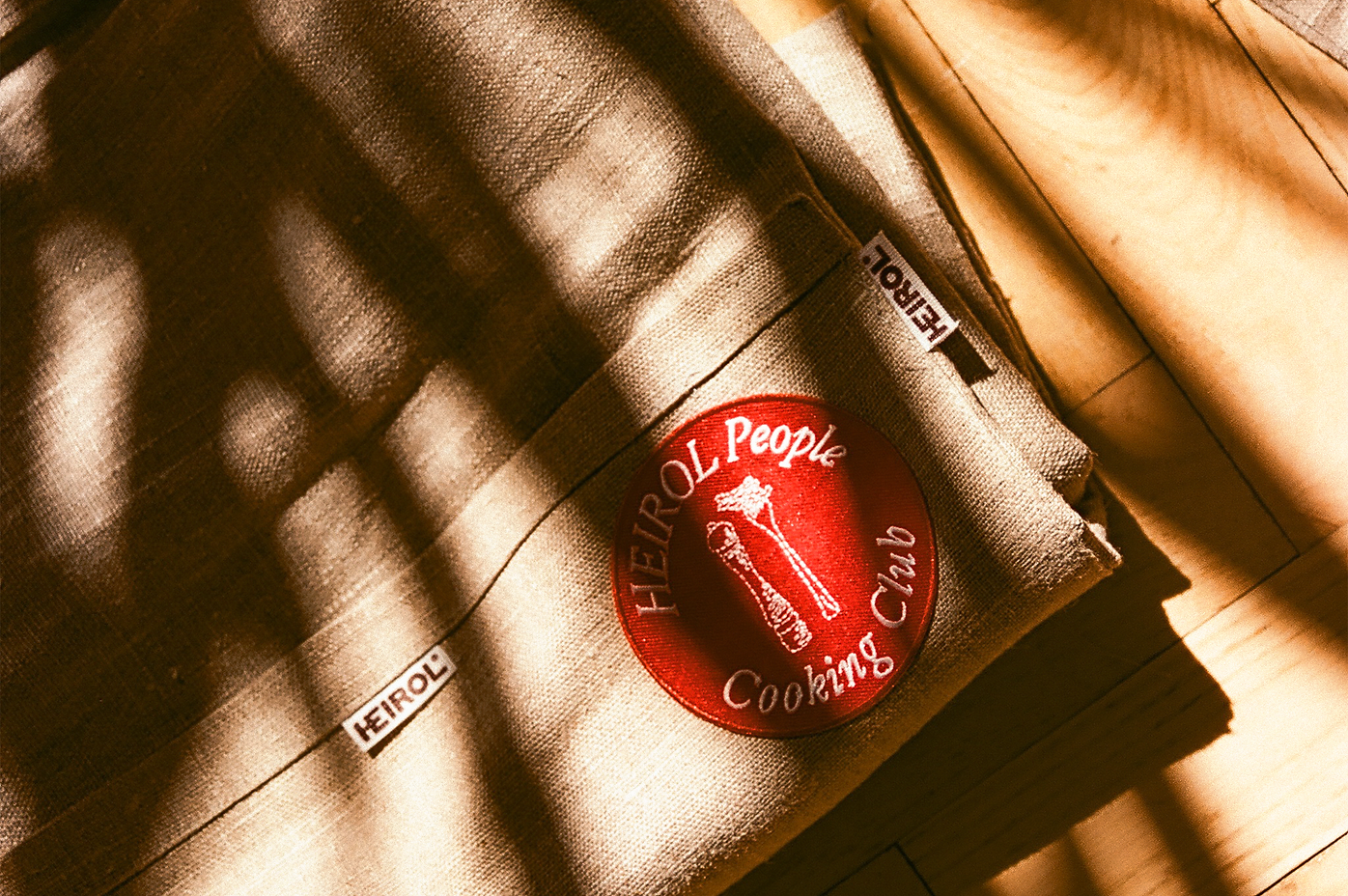 heirolpeoplecookingclub-merkki.png