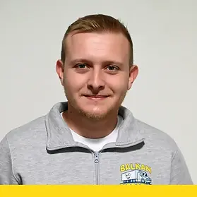 Profile photo of a male team member wearing a gray Balkan Dispatch hoodie