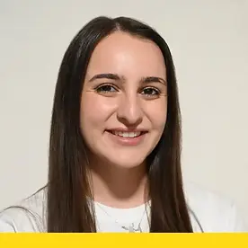 Profile photo of a female team member in a white Balkan Dispatch shirt