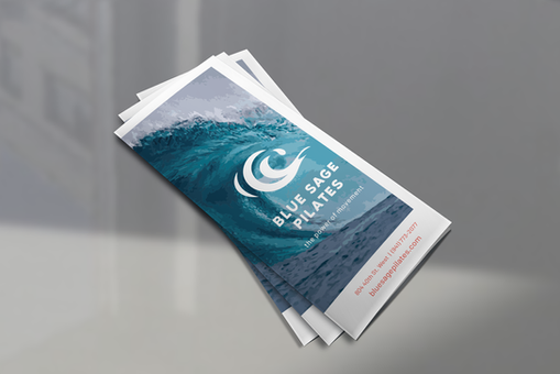 Stack of trifold brochures, folded to show the front of the design