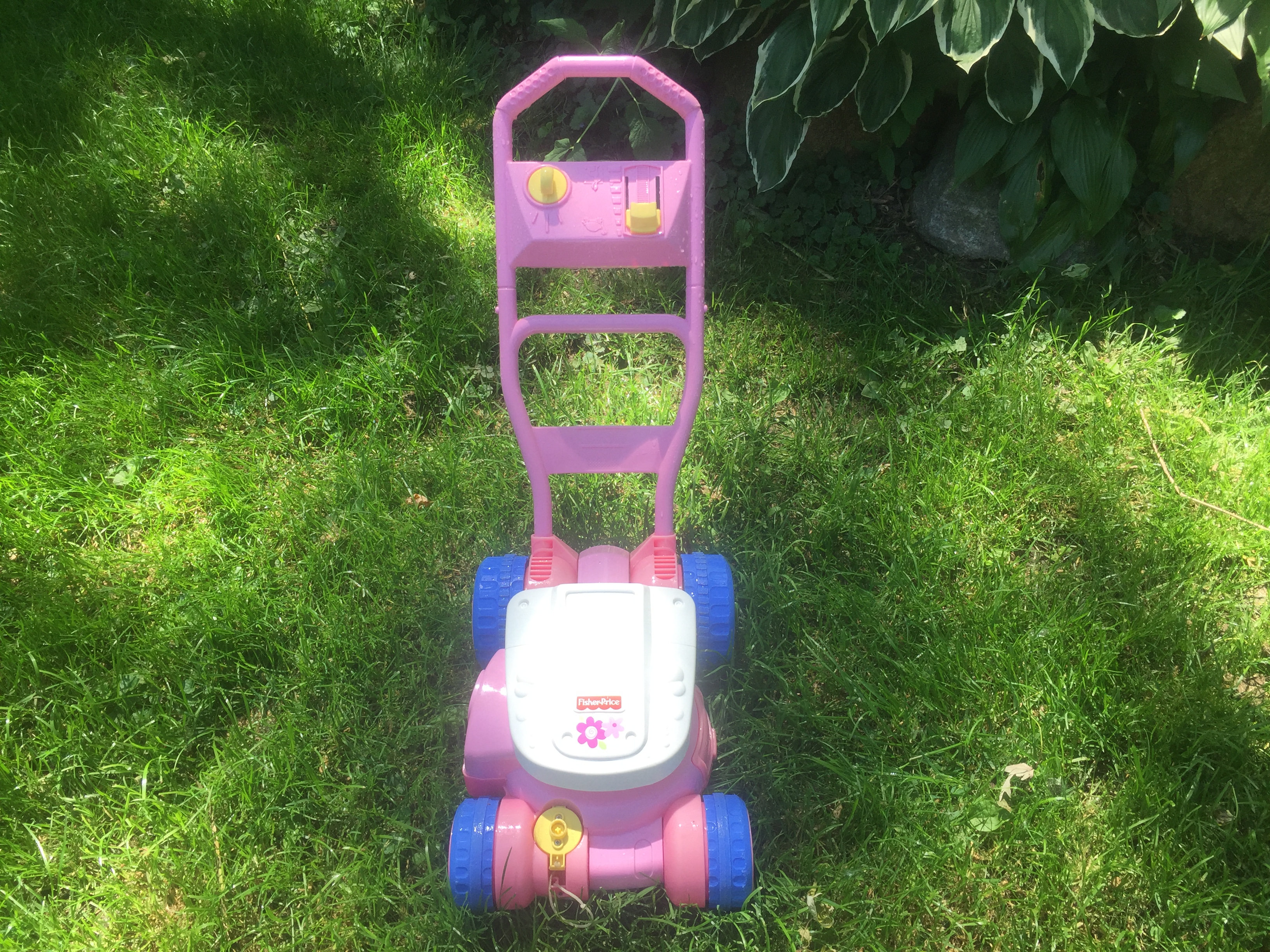 fisher price lawn mower pink