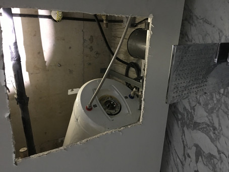 Replacing of 80litre storage heater above ceiling