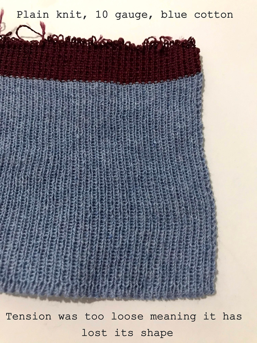 Blue cotton, plain knit, 10 gauge. I think my tension was too loose which caused it to loose its shape.