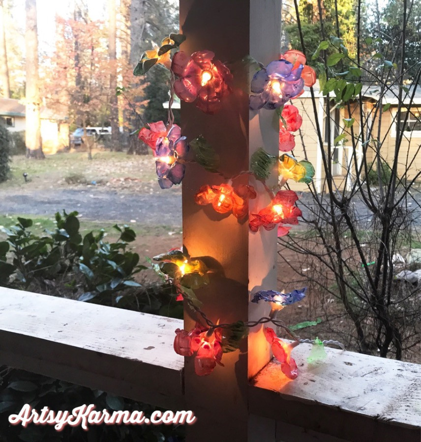 recycled plastic glued to string of lights