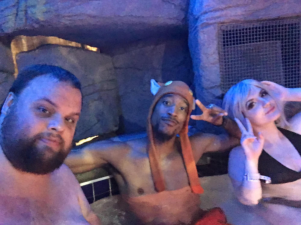 Darkfox Photography and two friends enjoying the hot tub at Colossalcon East 2018
