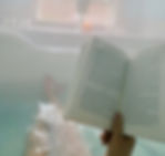 reading a book in the hot tub
