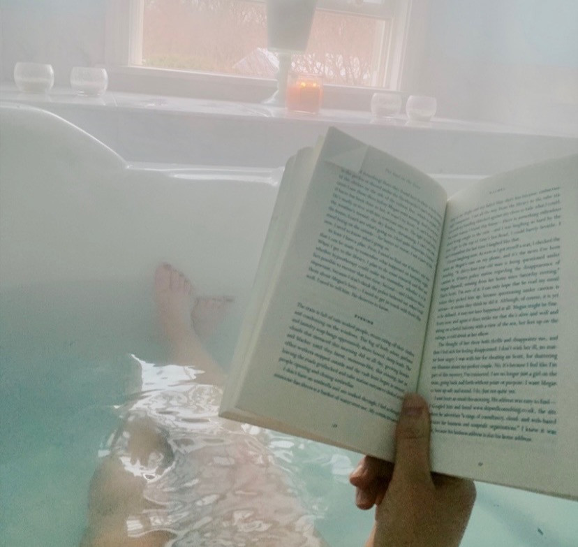 reading a book in the hot tub