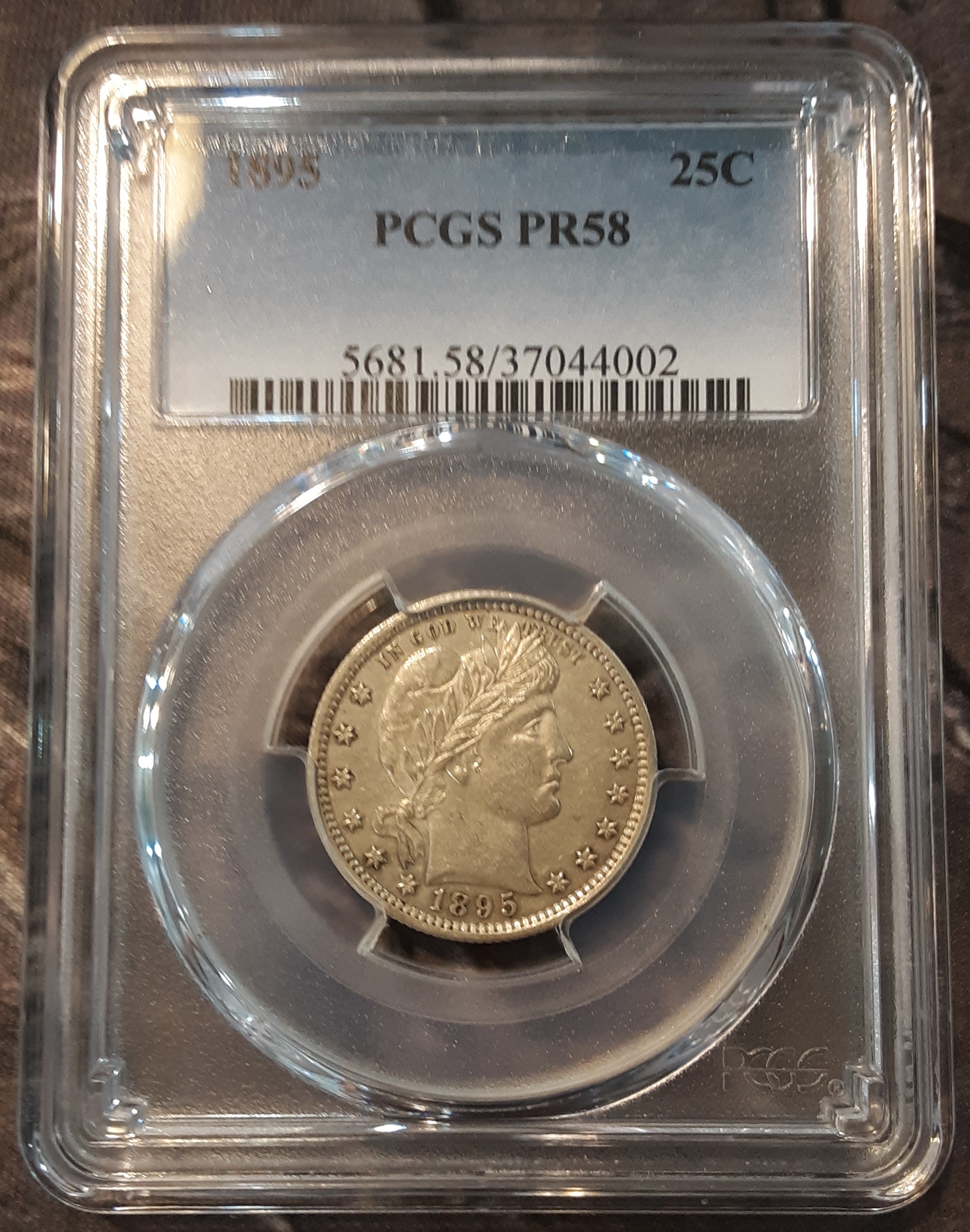 Just graded: 1895 Barber Quarter PCGS PR 58 content media
