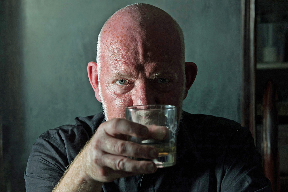 Cheers, though not really. Moray Treadwell as Hirst in London Classic's No Man's Land at Oldham Coliseum. Pics: company
