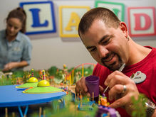 Imagineers Put Final Touches On The Toy Story Land Model For Walt Disney Presents