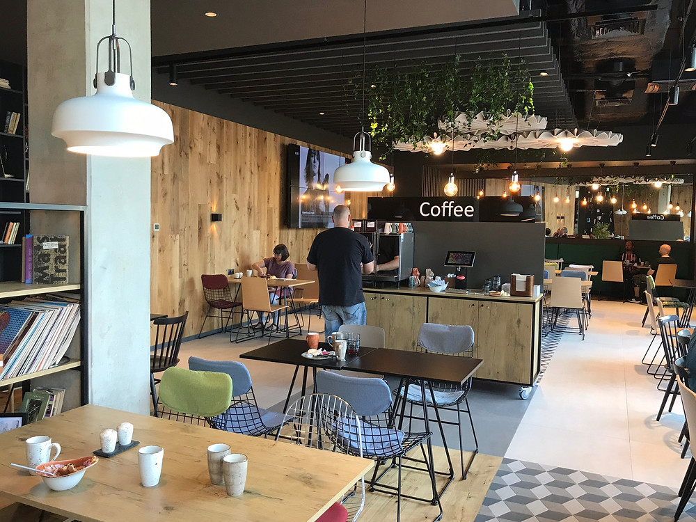 Dining room laid out for breakfast at the ibis tallinn city center hotel Estonia