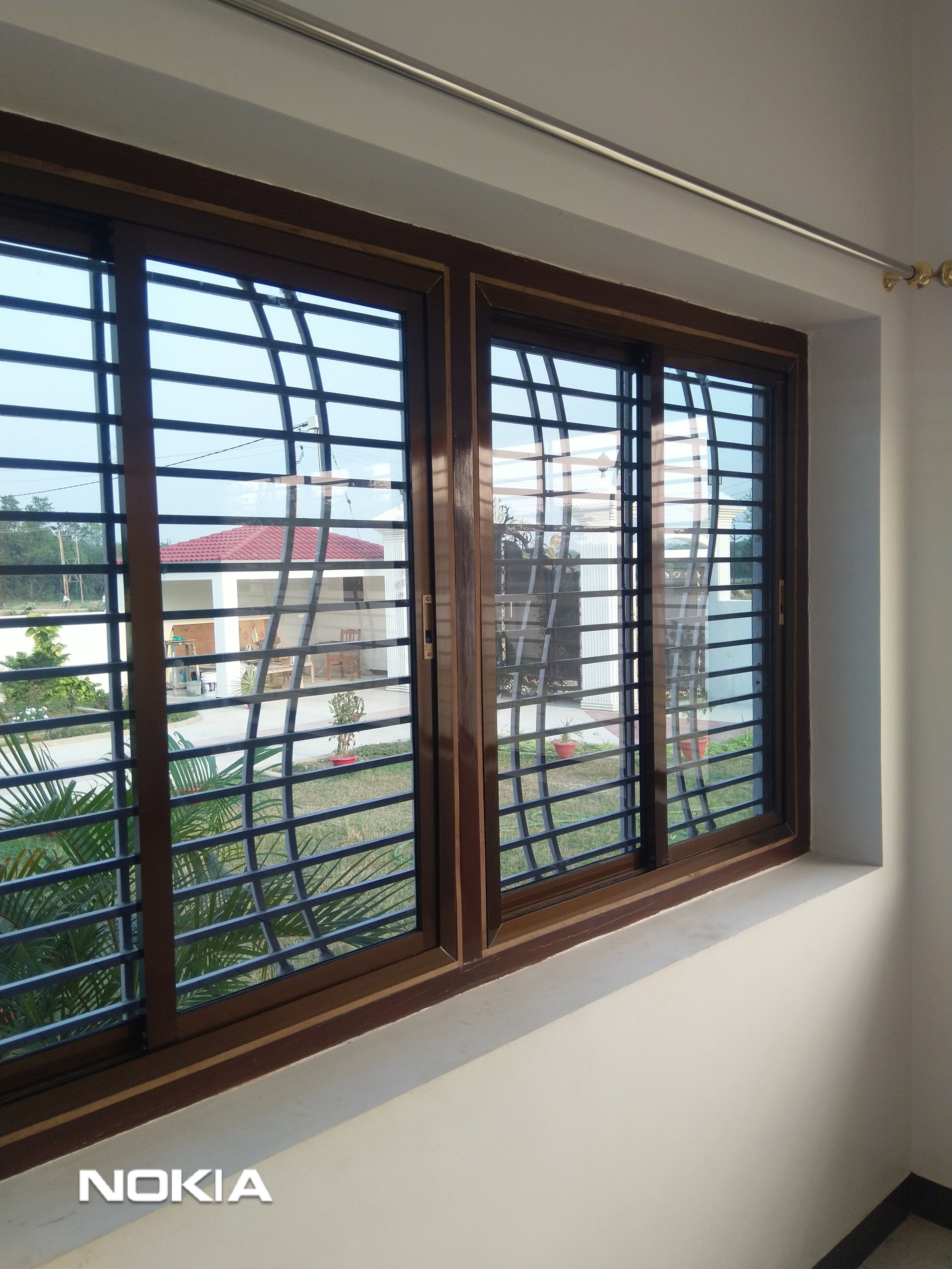 Glass window design home with grill price