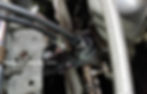 Bracket locating cruise and accelerator cable