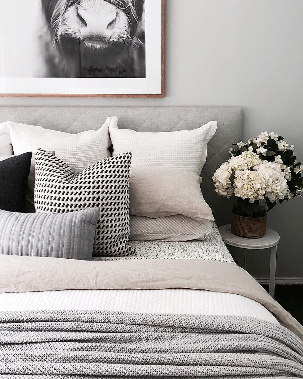 Cowboy Aesthetic Interiors bedroom with cow poster