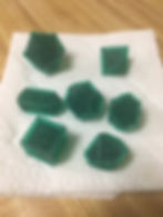 Dice on a paper towel with supports completely removed.