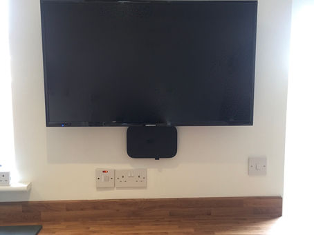 Medion TV hung on a kitchen wall in Mosborough