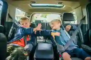kids fighting on the way to church