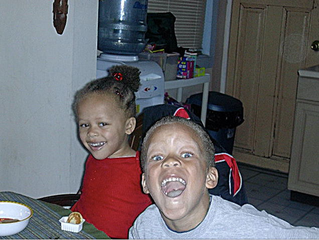 boy and girl at kitchen table